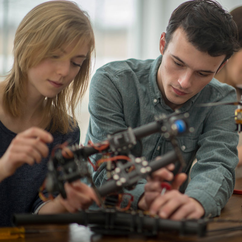 Students working on drone