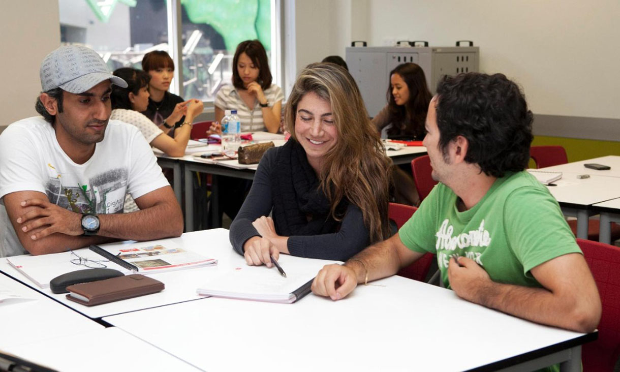 Students at a table in a classroom