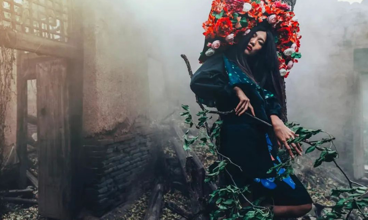 a model posing in front of camera and wearing cindy wei's design