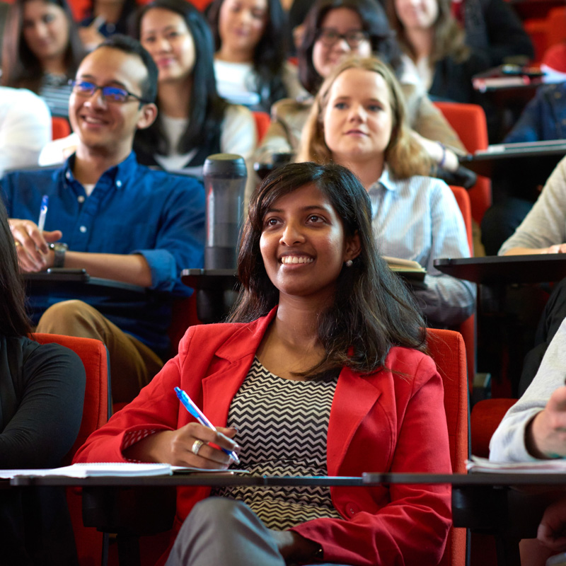 Group of people sitting in a lecture room