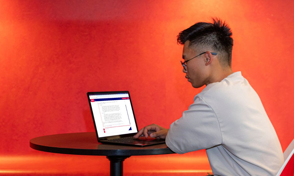 A student using Val on a laptop